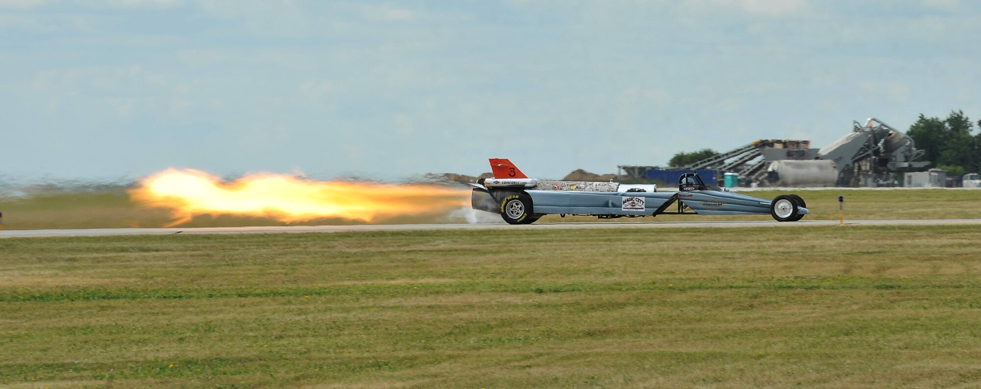 The Smoke-n-Thunder JetCar prepares to race against a plane during the Northern Neighbors Day Air Show at Minot Air Force Base, N.D., Aug. 13, 2016. The Smoke-n-Thunder is the fastest jet car in the air show industry. (U.S. Air Force photo/Airman 1st Class Jonathan McElderry)