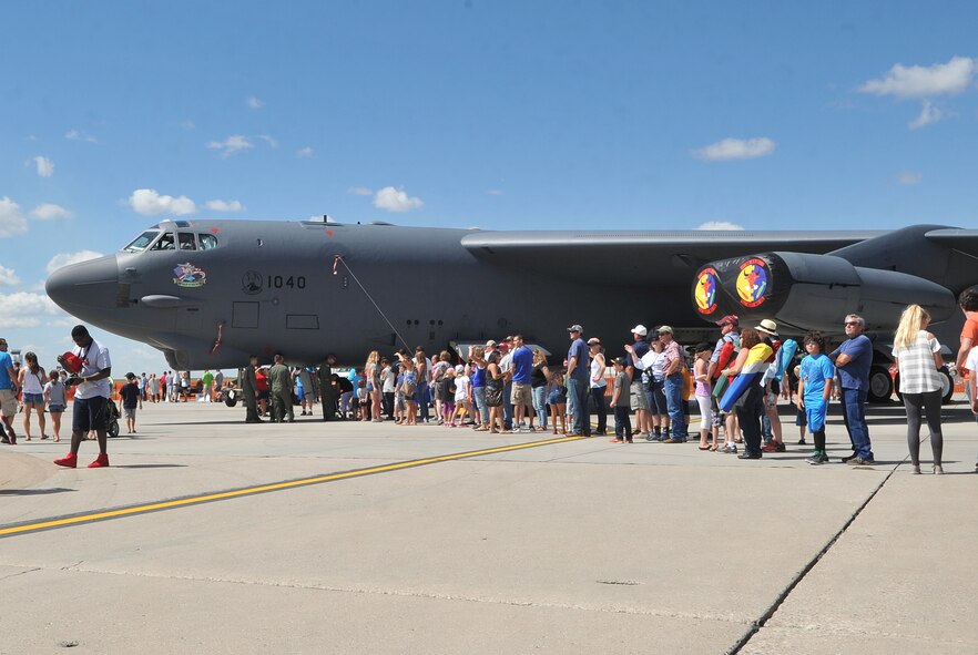 Several spectators wait in line to view one of the B-52H Stratofortress during the Northern Neighbors Day Air Show at Minot Air Force Base, N.D., Aug. 13, 2016. The B-52 is a heavy bomber aircraft capable of flying at a maximum speed of 650 mph. (U.S. Air Force photo/Airman 1st Class Jonathan McElderry)