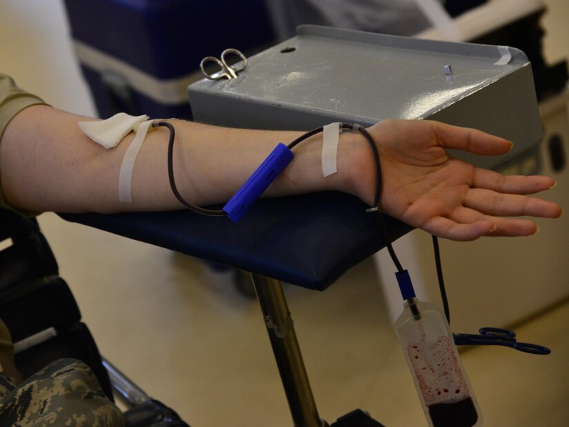 A U.S. Air Force Airman donates blood to the Armed Services Blood Program during a donation drive at Langley Air Force Base, Va., Aug. 10, 2016. The blood drives are held to support injured military service members or civilians in need of blood, overseas or in the U.S. (U.S. Air Force photo by Airman 1st Class Tristan Biese)