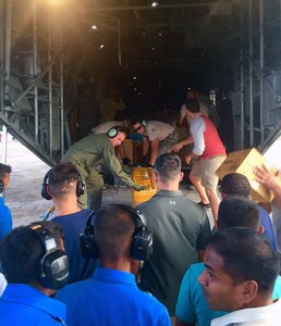 U.S. Military members and the Sri Lankan Air Force work together to unload medical supplies from a U.S. Air Force C-130 aircraft during Pacific Angel (PACANGEL) 16-3 in Jaffna, Sri Lanka, Aug. 13, 2016. PACANGEL is a multilateral humanitarian assistance/civil military operation, which improves military-to-military partnerships in the Pacific while also providing medical health outreach, civic engineering projects and subject matter exchanges among partner forces. 