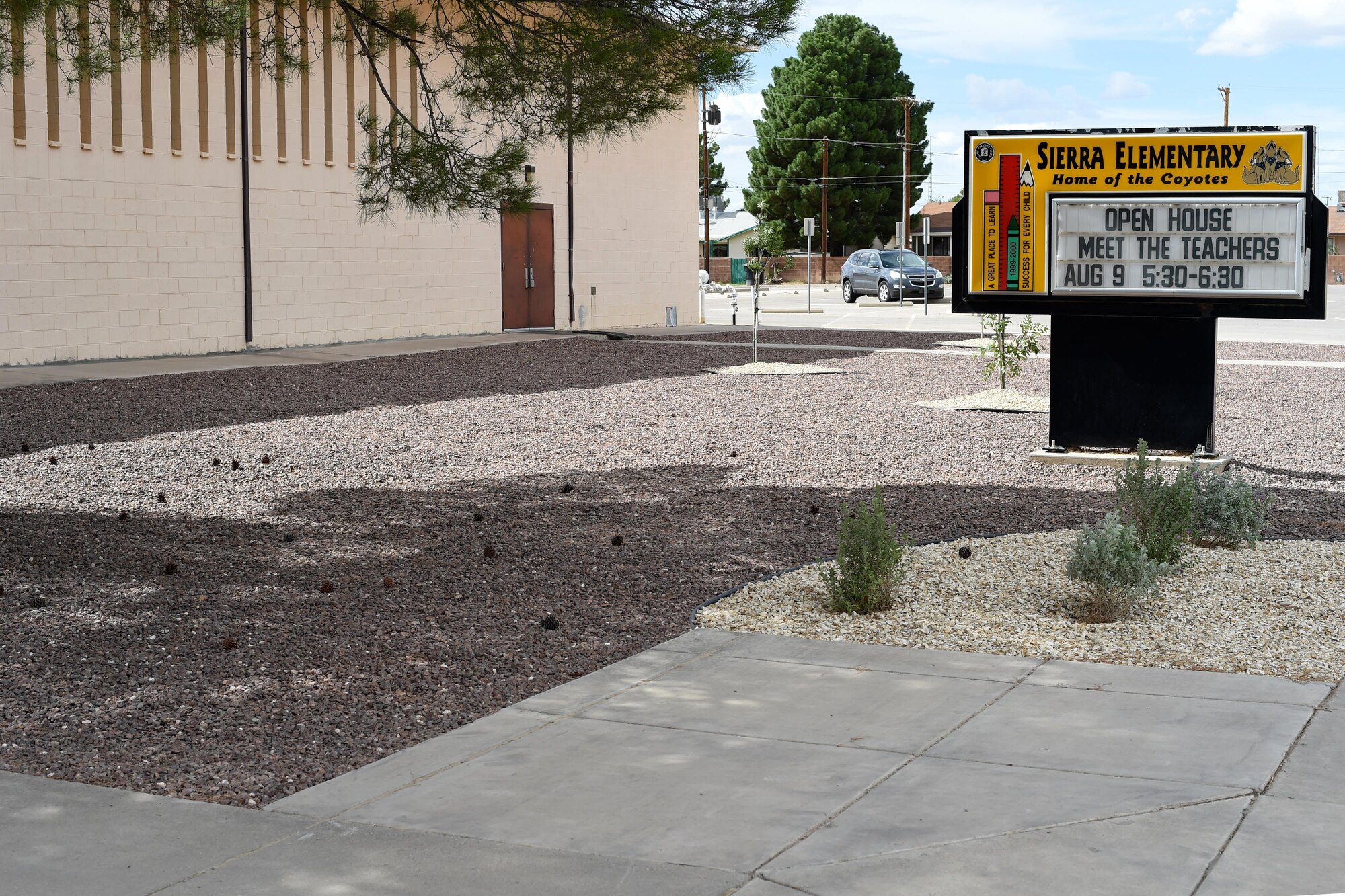 The entrance to Sierra Elementary School in Alamogordo, N.M., underwent renovations by Big Give volunteers in July. The area was damaged due to flooding within the recent years. (U.S. Air Force photo by Staff Sgt. Eboni Prince)