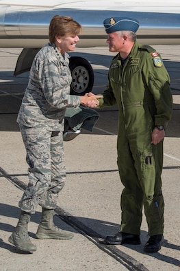 Major-General Christian Drouin (right), Commander of 1 Canadian Air Division, welcomes General Lori Robinson (left), Commander of the North American Aerospace Defense Command and U.S. Northern Command, to 4 Wing Cold Lake, Alberta, Canada, August 15, 2016.