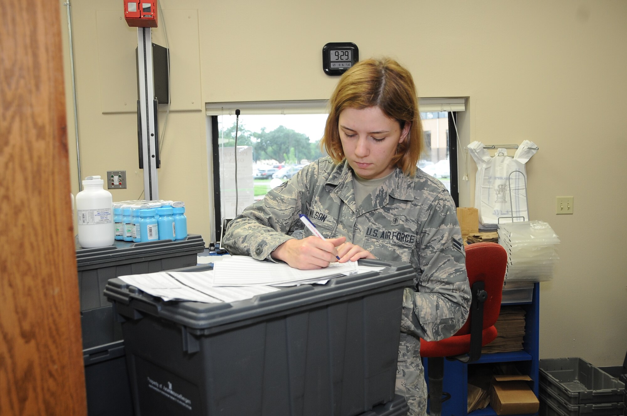 Airman 1st Class Audrey Wilson, 2nd Medical Group medical logistics technician, keeps track of new medication at Barksdale Air Force Base, La., Aug. 16, 2016. The Satellite Pharmacy and the pharmacy at the 2nd Med Group supports over 39,000 people. (U.S. Air Force photo/Airman 1st Class Stuart Bright)