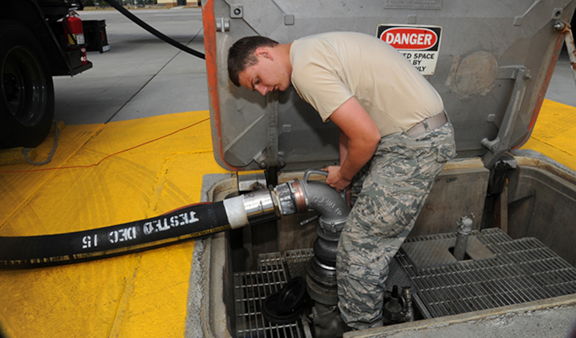 Airman 1st Class Michael Peek, 92nd Logistics Readiness Squadron refueling equipment operator, connects a hydrant refueling truck to the fuel mains Aug. 8, 2016, at Fairchild Air Force Base, Wash. Refueling hydrant trucks are mobile fuel pumps that are capable of pumping fuel up to 300 gallons per minute. (U.S. Air Force photo/Senior Airman Sam Fogleman)