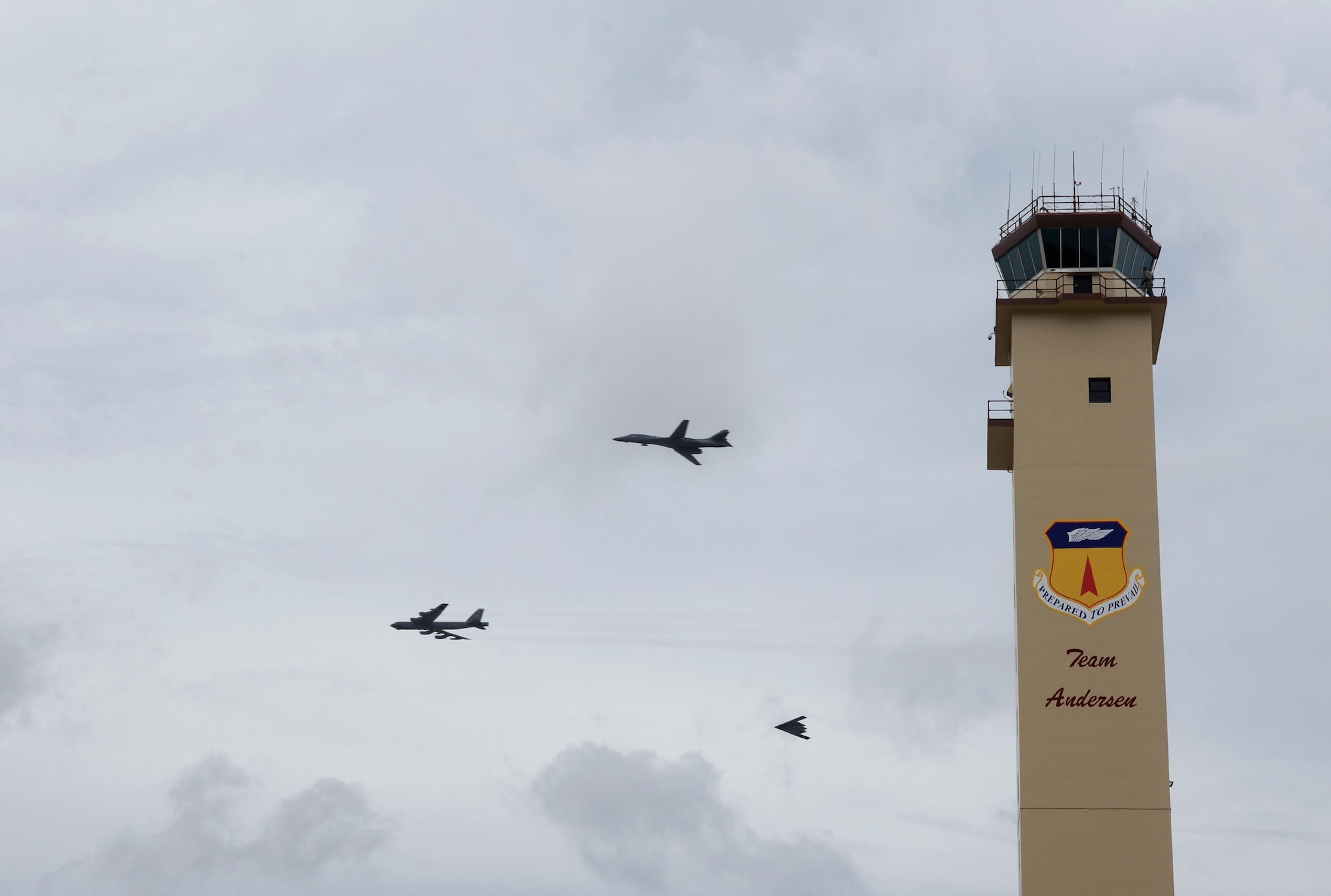 A U.S. Air Force B-52 Stratofortress, B-1 Lancer and B-2 Spirit conduct a flyover at Andersen Air Force Base, Guam, Aug.17, 2016. This marks the first time in history that all three of Air Force Global Strike Command's strategic bomber aircraft are simultaneously conducting operations in the U.S. Pacific Command area of operations. The B-1 Lancer will replace the B-52 in support of the U.S. Pacific Command Continuous Bomber Presence mission. (U.S. Air Force photo by Staff Sgt. Benjamin Gonsier)