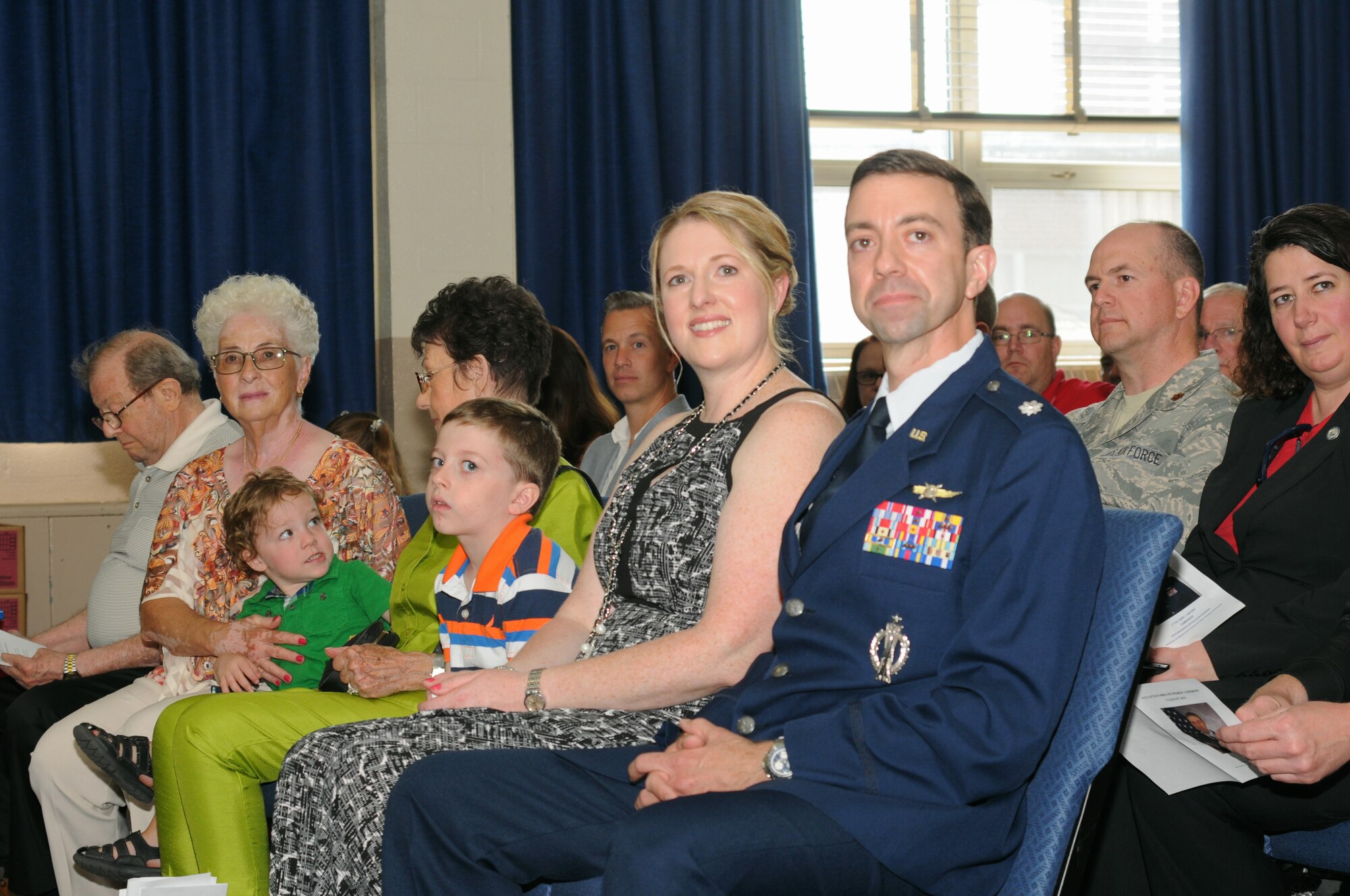 Lt. Col. Geno Rapone, Commander of the 270th Engineering and Installation Squadron, is accompanied by family and friends along with service members from across the 111th Attack Wing during his retirement ceremony at Horsham Air Guard Station, Pa. on August 13, 2016. Service members from across the Wing gathered to thank Rapone for all he has done for the wing throughout the years.  (U.S. Air National Guard photo by Staff Sgt. Michael Shaffer)
