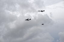 A U.S. Air Force B-52 Stratofortress, B-1 Lancer and B-2 Spirit fly over Guam after launching from Andersen Air Force Base, Guam, for an integrated bomber operation, Aug.17, 2016. This mission marks the first time in history that all three of Air Force Global Strike Command's strategic bomber aircraft are simultaneously conducting integrated operations in the U.S. Pacific Command area of operations. As of Aug. 15, the B-1 Lancer will be temporarily deployed to Guam in support of U.S. Pacific Command’s Continuous Bomber Presence mission. (U.S. Air Force photo by Airman 1st Class Jacob Skovo)