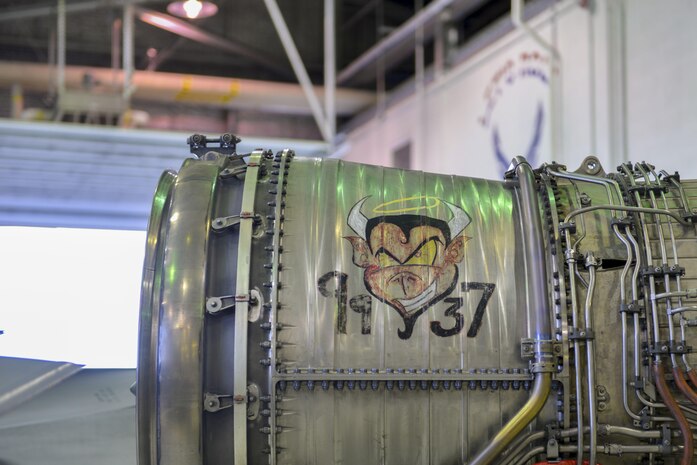 The removal of an engine from a U.S. Air Force F-16 Fighting Falcon aircraft Aug. 12, 2016, during RED FLAG-Alaska 16-3, in the Eielson Air Force Base, Alaska, phase shop displays unique engine art during RED FLAG-Alaska 16-3. The F-16 Fighting Falcon’s top speed is more than 1,500 miles per hour. (U.S. Air Force photo by Airman Isaac Johnson)