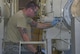 Senior Airman Robert Edmons, 374th Logistics Readiness Squadron fuels laboratory technician, takes a fuel sample from a tank at Yokota Air Base, Japan, Aug. 17, 2016. The sample is then taken to the laboratory to test for potential contamination before the fuel is provided to the aircraft. (U.S. Air Force photo by Senior Airman David Owsianka/Released)