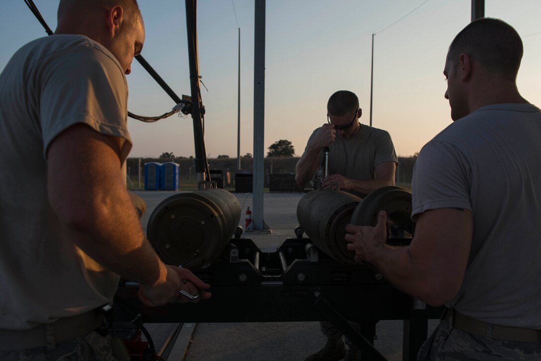 U.S. Airmen assigned to the 447th Expeditionary Aircraft Maintenance Squadron assemble GBU-12 Paveway II laser-guided bombs Aug. 8, 2016, at Incirlik Air Base, Turkey. A GBU-12 is a type of bomb employed on an A-10 Thunderbolt II, which is operated out of Incirlik. (U.S. Air Force photo by Senior Airman John Nieves Camacho)