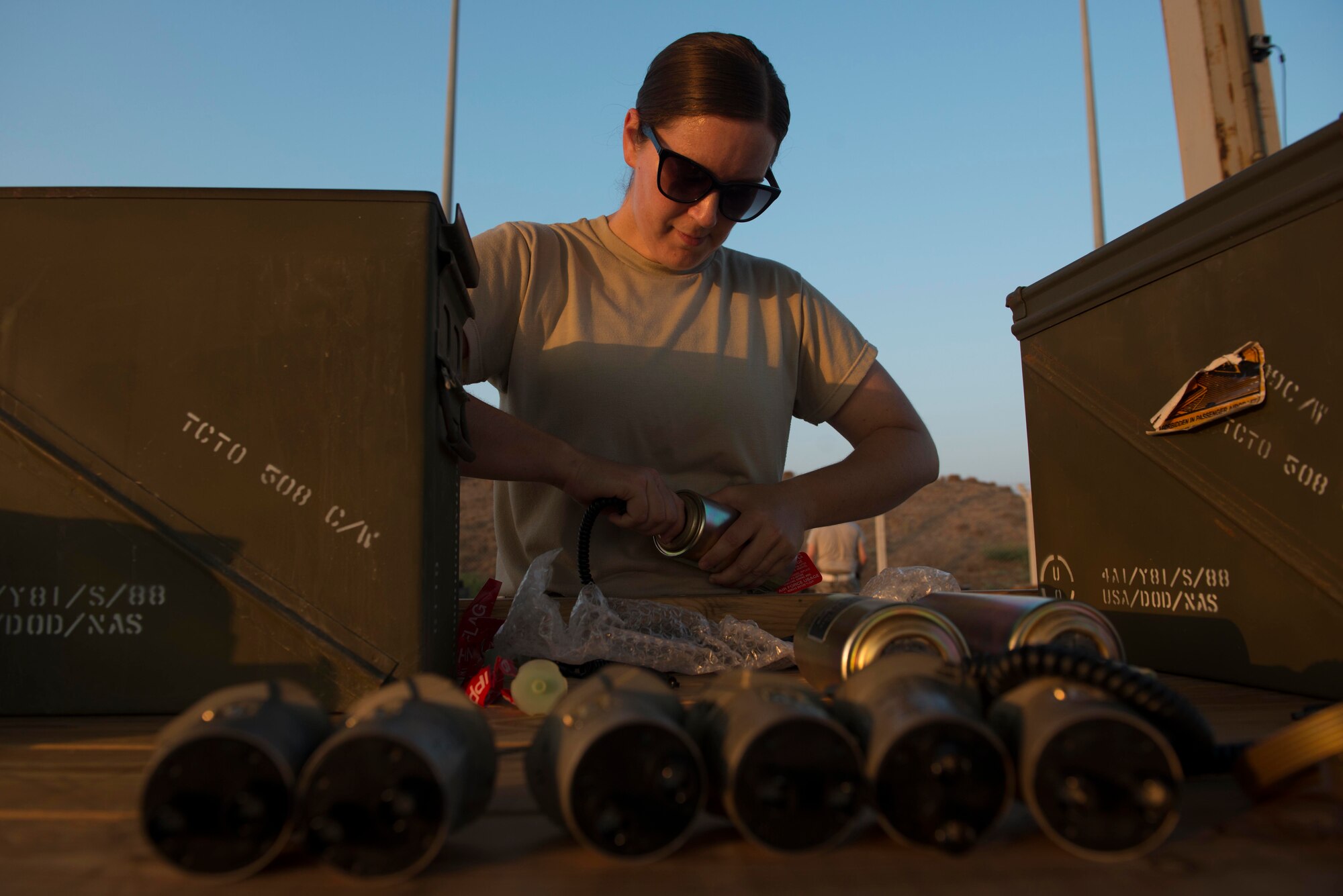 U.S. Air Force Master Sgt. Patricia Winn, 447th Expeditionary Aircraft Maintenance Squadron munitions systems specialist, inspects fuses prior to installation on a GBU-12 Paveway II laser-guided bomb Aug. 8, 2016, at Incirlik Air Base, Turkey. Munitions systems specialists perform inventories and correct discrepancies found with munitions. (U.S. Air Force photo by Senior Airman John Nieves Camacho)