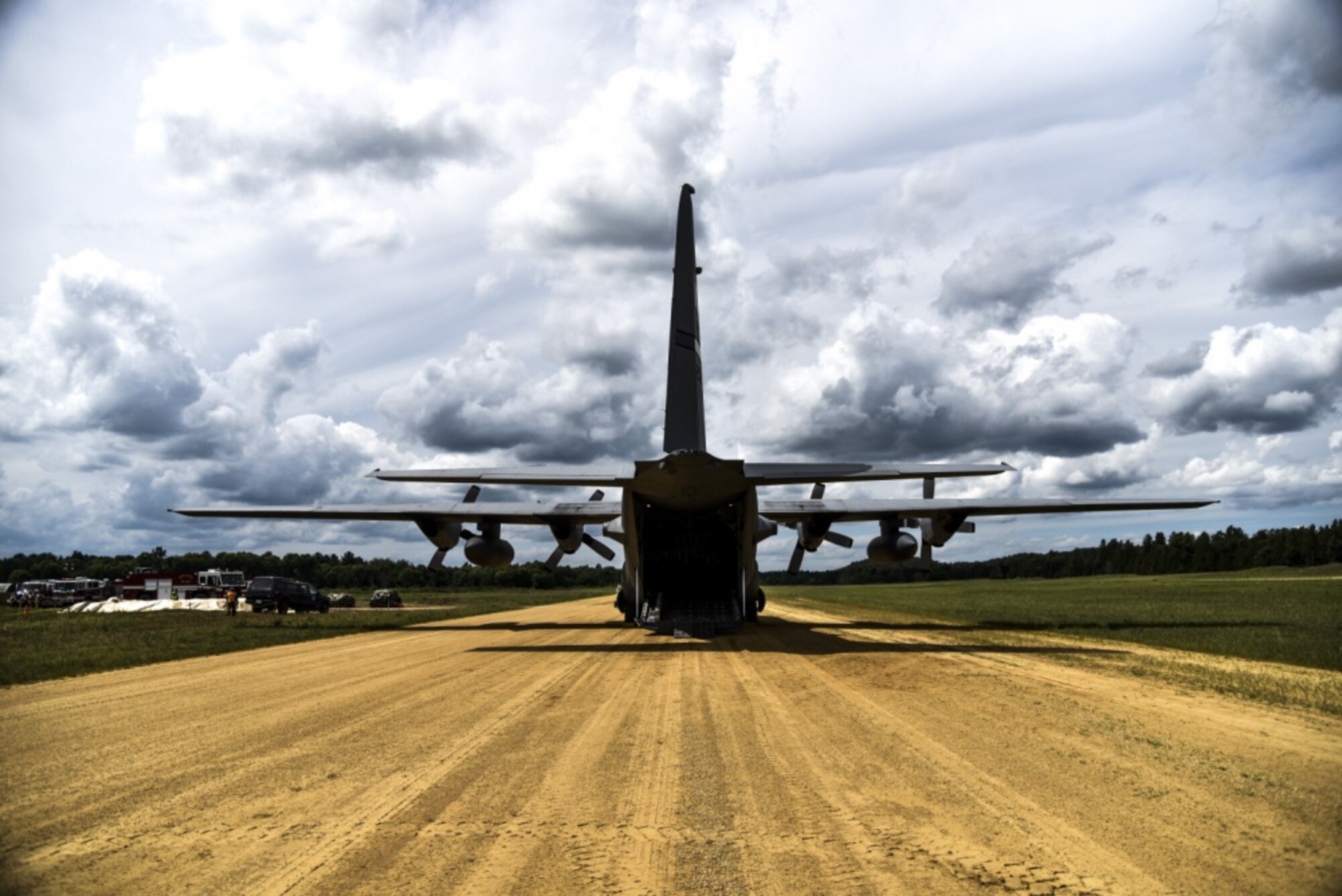 A C-130 Hercules sits on the flightline while Citizen Airmen from Air Force Reserve Command participated in exercise Patriot Warrior at Fort McCoy, Wis., August 15, 2016. Patriot Warrior is a joint exercise designed to demonstrate contingency deployment training ranging from bare base buildup to full operational capabilities. More than 11,000 members from the U.S. service branches and their Reserve components, including Air Force, Army, Navy, and Marines are participating alongside British, Canadian, and Saudi Arabian forces. This exercise evaluates the ability of Air Force Reserve units to deploy mobility airlift and agile combat support capabilities in support of joint theater operations. (U.S. Air Force photo by Staff Sgt. Adam C. Borgman) 