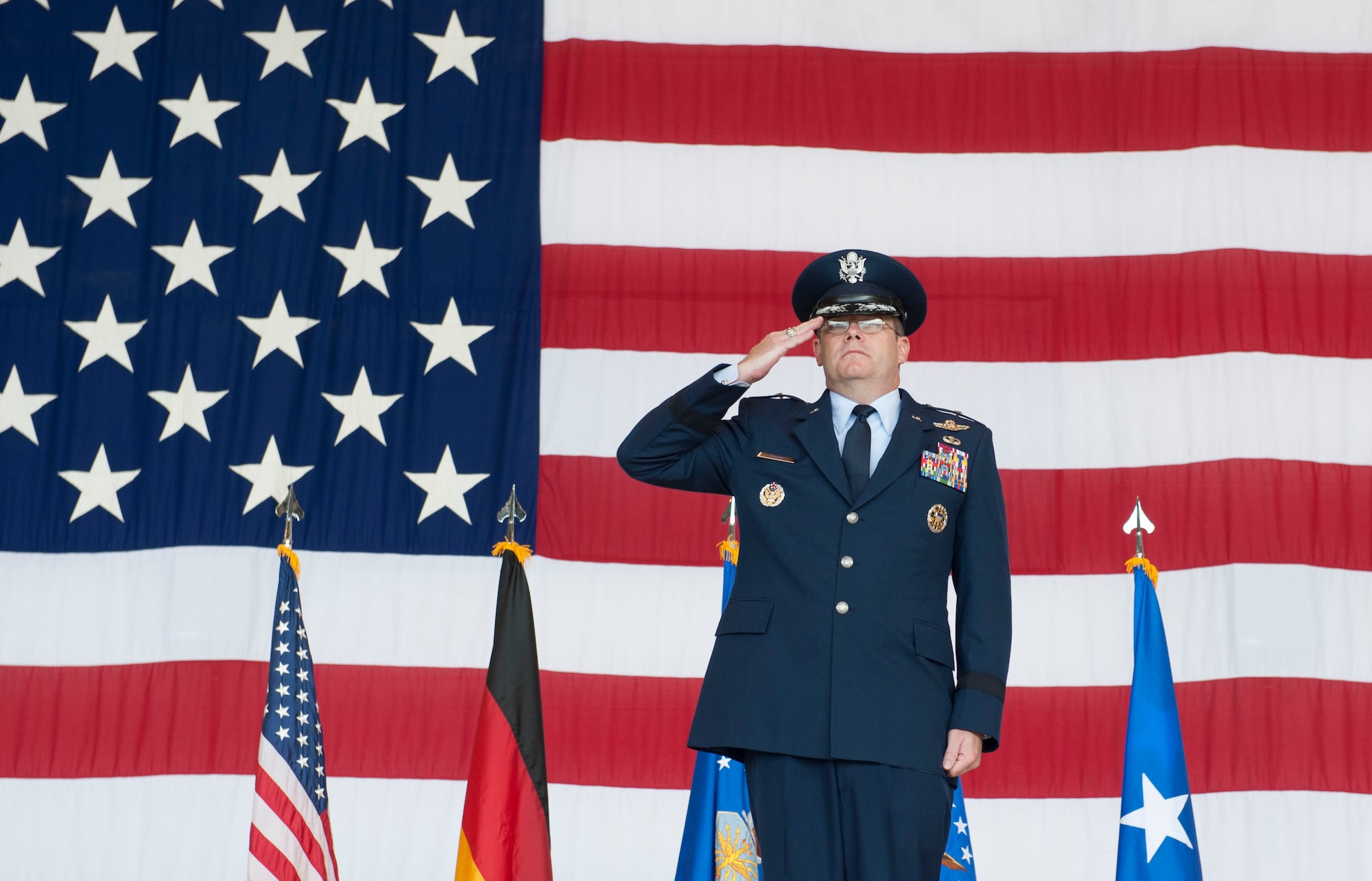 Brig. Gen. Richard G. Moore Jr. renders his first salute as the 86th Airlift Wing commander Aug. 17, 2016, Ramstein Air Base, Germany. Moore took on command of approximately 9,000 Airmen at the 86th AW. (U.S. Air Force photo/ Airman 1st Class Lane Plummer)