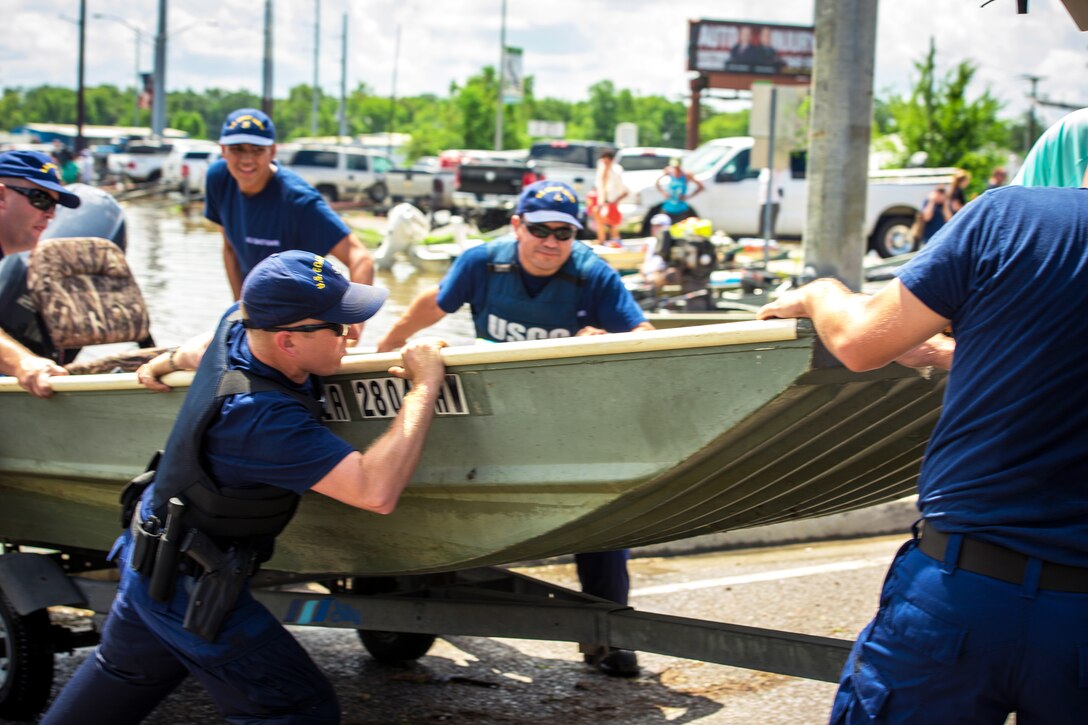 Coast Guardsmen assist local, state and federal agencies in the search for residents amid severe flooding near Saint Amant, La., Aug. 16, 2016. Coast Guard photo by Petty Officer 2nd Class LaNola Stone 