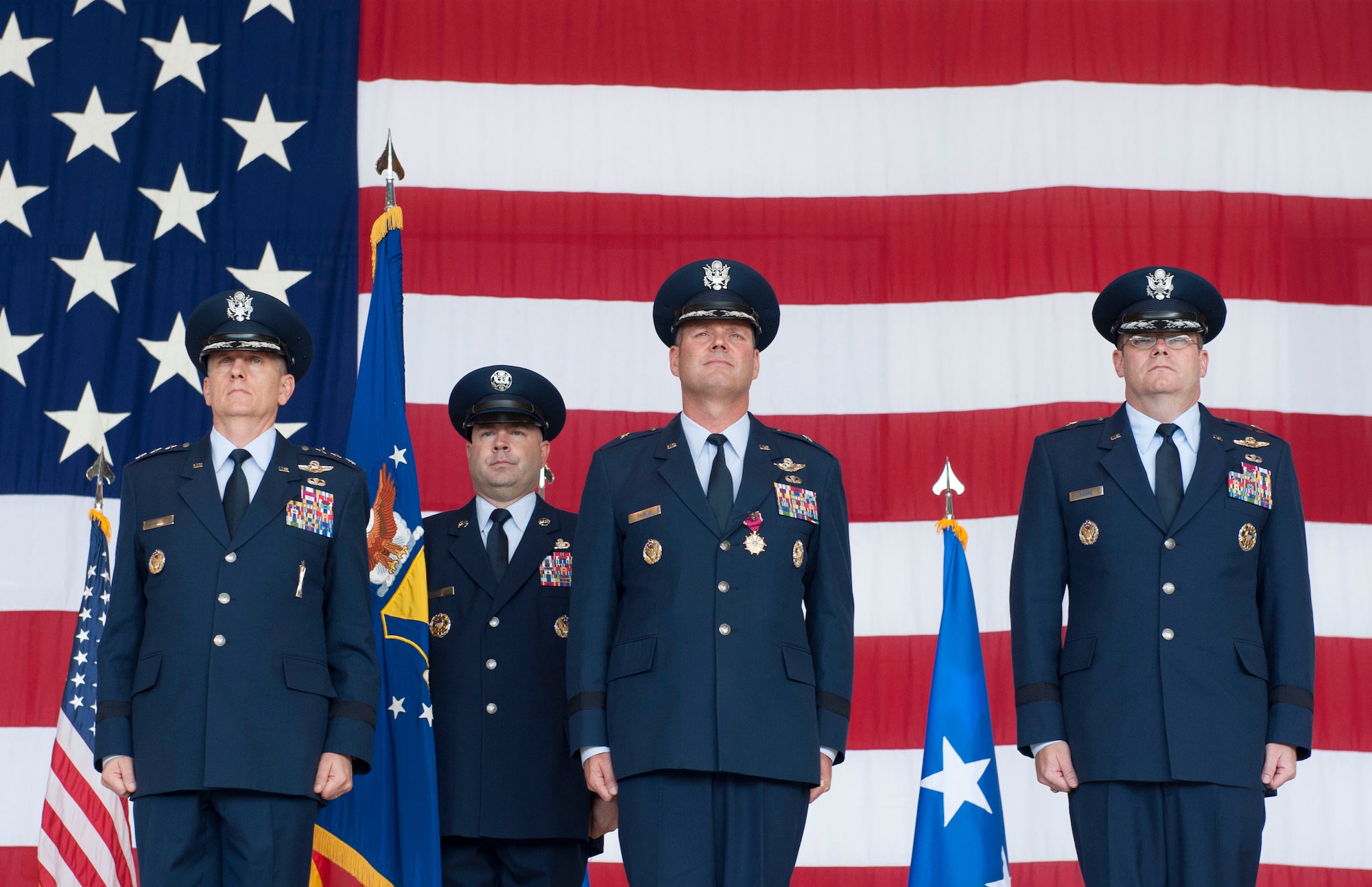 Lt. Gen. Timothy M. Ray, 3rd Air Force commander, left, prepares to conduct a change of command Aug. 17, 2016, Ramstein Air Base, Germany. Ray presided the ceremony in which Brig. Gen. Richard G. Moore Jr., right, took command of the 86th Airlift Wing from Brig. Gen. Jon T. Thomas, center. (U.S. Air Force photo/ Airman 1st Class Lane Plummer)