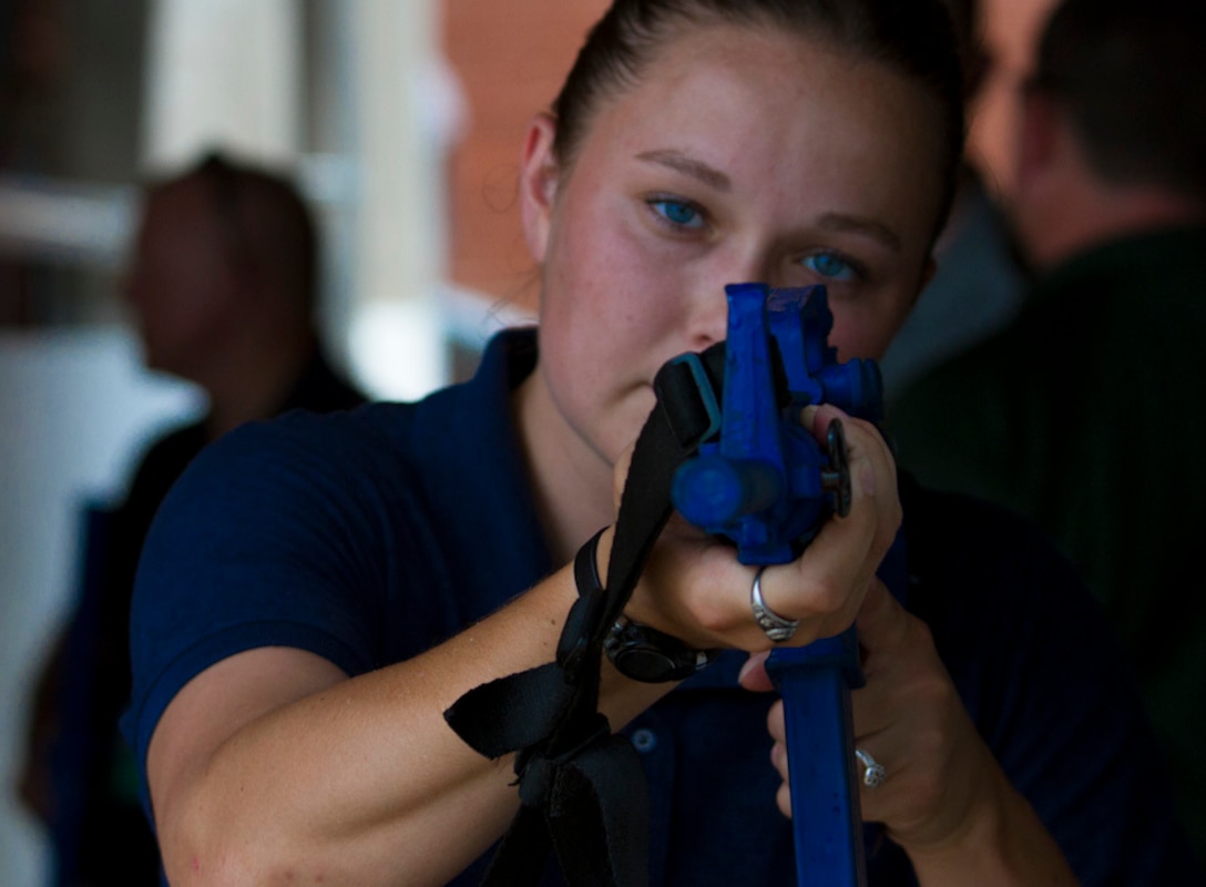 A U.S. Army Reserve special agent practices clearing a corner during Guardian Shield, 1 Aug., 2016. Agents from Criminal Investigation Commands across the United States, belonging to the 200th Military Police Command, gathered in Charleston, S.C., July 24 to Aug. 5, for Guardian Shield, 2016. Guardian Shield is a two-week training that certifies agents in various courses such as crime and intelligence analysis, drug suppression and domestic violence intervention. (U.S. Army Reserve Photo by Sgt. Audrey Hayes)