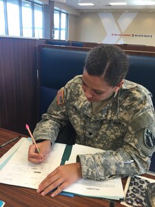 FORT MEADE, Md. - In preparation for her first day of announcing, Spc. Monique O'Neill marks up her broadcast copy (to help her remember how she wants to sound on air) after class on August 16, 2016. O'Neill is enrolled in class at the Defense Information School to become a "46R," or "Broadcast Videographer." Upon completion, O'Neill will have attained skills in video shooting and editing, radio operation, voice and broadcast writing skills; and will continue to practice at her unit, the 206th Broadcast Operations Detachment in Grand Prairie, Texas.  (U.S. Army Reserve photo by Sgt. Rebecca Newton/Released)