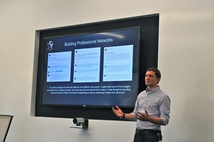 Daniel Savage (right), veterans program manager for LinkedIn, briefs Army Reserve Ambassadors belonging to the 63rd Regional Support Command, during their visit to LinkedIn’s headquarters, Mountain View, Calif., Aug. 12. Savage briefed the ambassadors on the initiatives LinkedIn is taking to assist transitioning veterans in their journey to find work outside the military. (Army Reserve Photo by Alun Thomas)