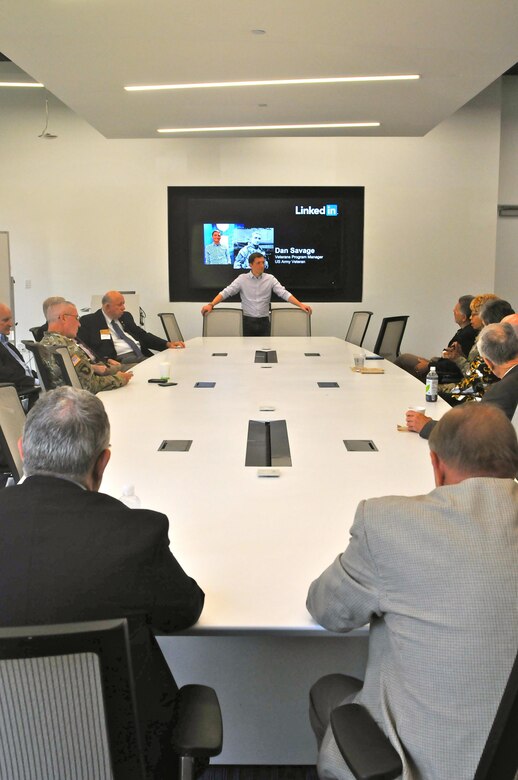 Daniel Savage (center, top), veterans program manager for LinkedIn, fields questions from Army Reserve Ambassadors belonging to the 63rd Regional Support Command, during their visit to LinkedIn’s headquarters, Mountain View, Calif., Aug. 12. Savage briefed the ambassadors on the initiatives LinkedIn is taking to assist transitioning veterans in their journey to find work outside the military. (Army Reserve Photo by Alun Thomas)