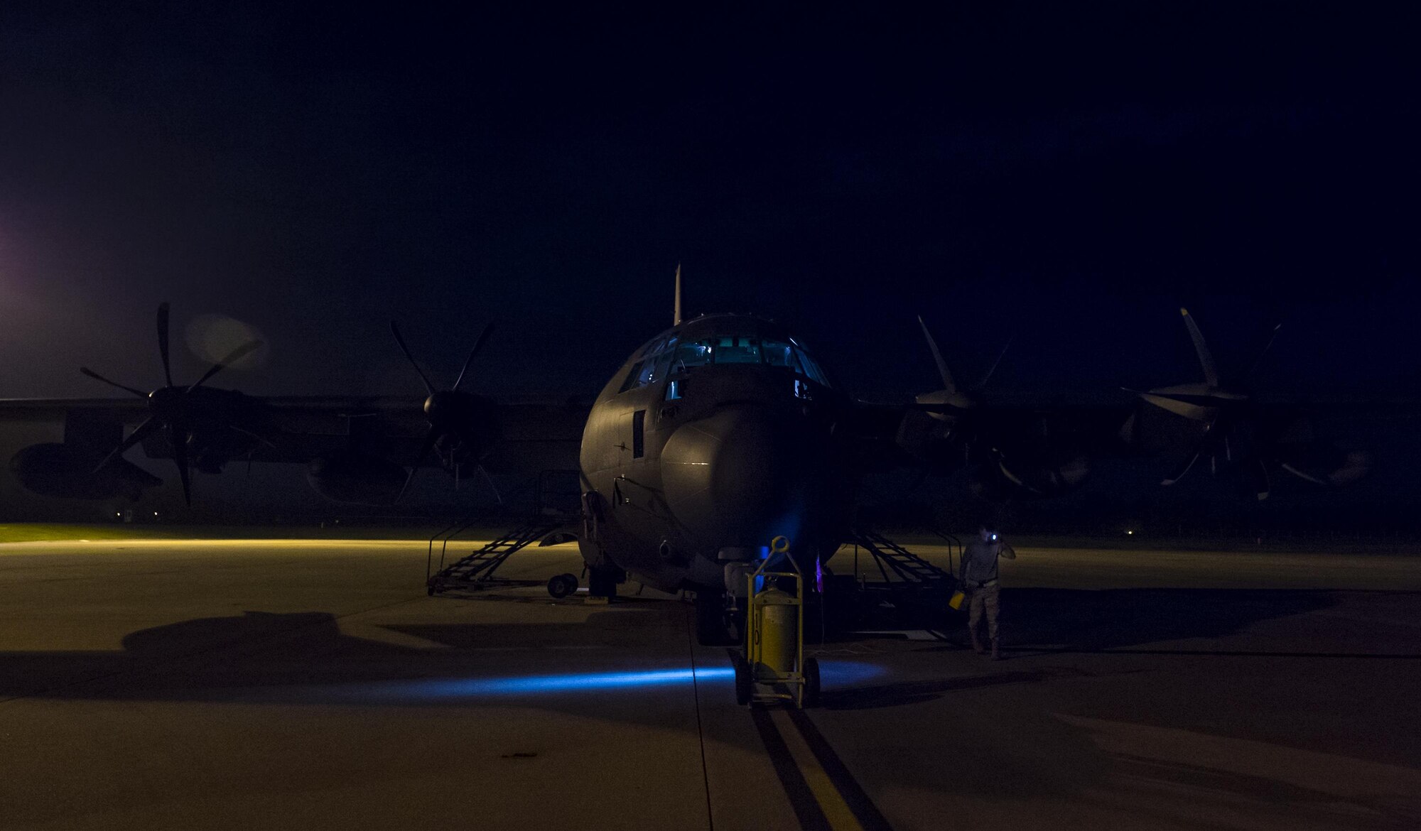 U.S. Air Force Senior Airman Daniel Cassidy, 723d Aircraft Maintenance Squadron electronic warfare journeyman, prepares to remove panels and load flares onto an HC-130J Combat King II, Aug. 17, 2016, at Moody Air Force Base, Ga. Flares are sometimes used as countermeasures to protect the aircraft from enemy fire. (U.S. Air Force photo by Airman 1st Class Janiqua P. Robinson)