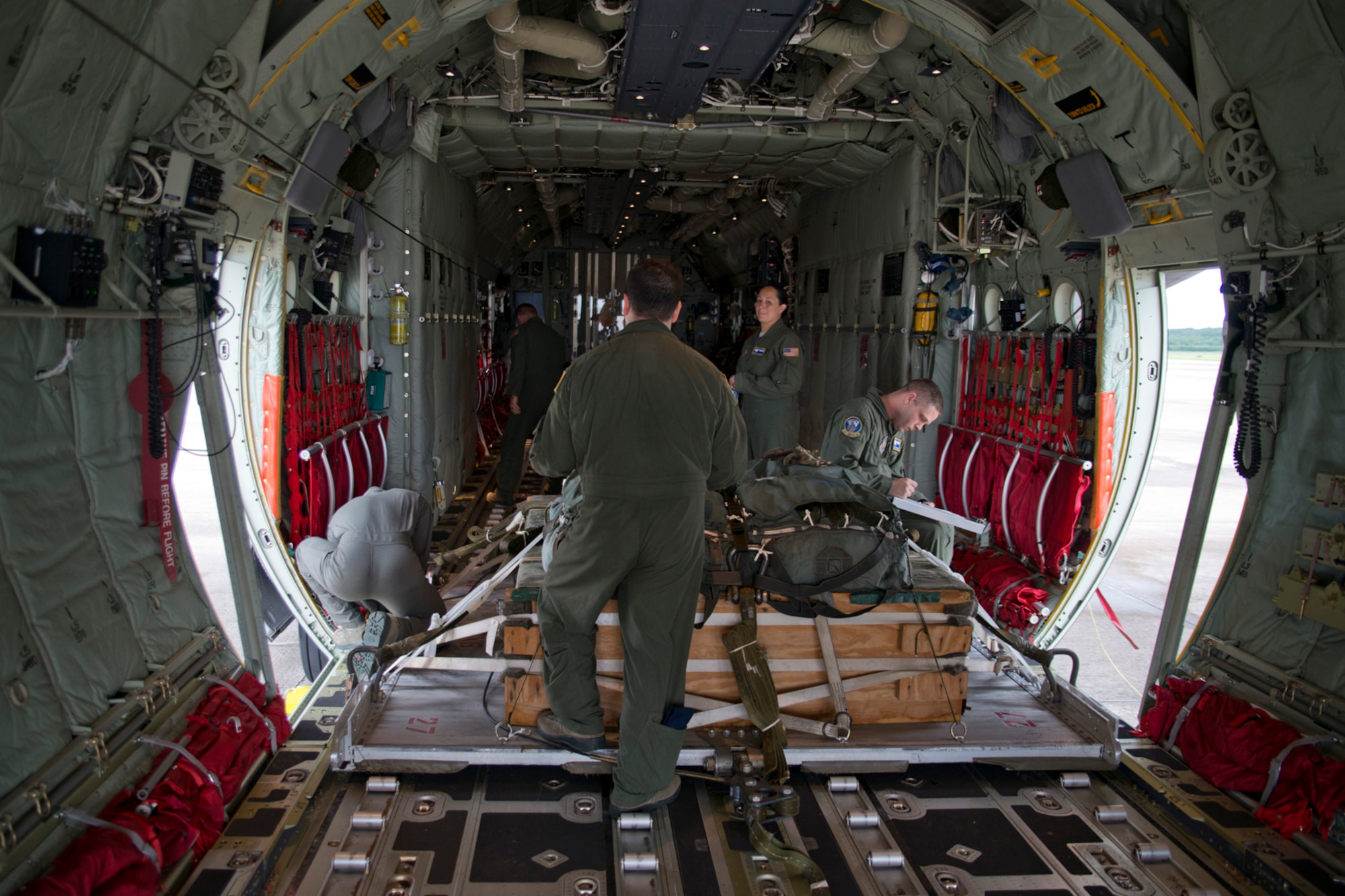 Loadmasters assigned to the 327th Airlift Squadron secure a pallet on a C-130J Super Hercules during the August Unit Assembly Training (UTA) weekend at Little Rock Air Force Base, Ark., Aug. 13, 2016. Two aircraft were part of a mission that passed a milestone for the 913th Airlift Group by being the first C-130J two-ship mission on a UTA weekend. (U.S. Air Force photo by Master Sgt. Jeff Walston) 