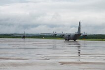 Two C-130J Super Hercules aircraft taxi to the runway at Little Rock Air Force base, Ark., Aug. 13, 2016. The two aircraft were part of a mission that passed a milestone for the 913th Airlift Group by being the first C-130J two-ship mission on a Unit Assembly Training weekend. (U.S. Air Force photo by Master Sgt. Jeff Walston) 