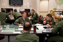 Airmen assigned to the 327th Airlift Squadron, 61st Airlift Squadron and 41st Airlift Squadron participate in mission briefs during the August Unit Assembly Training (UTA) weekend at Little Rock Air Force Base, Ark., Aug. 13, 2016. The 913th Airlift Group passed a milestone by flying the first C-130J two-ship mission on a UTA. (U.S. Air Force photo by Master Sgt. Jeff Walston) 