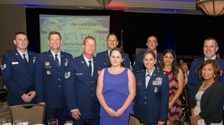 Two members of the 45th Space Wing were recognized at the Melbourne Regional Chamber of Commerce’s 2016 Valor Awards banquet on Aug. 17, 2016.  Brig. Gen. Wayne Monteith, 45th Space Wing Commander, assisted with the presentations to Tech. Sgt William Shankles, of the 45th Space Wing Security Forces Squadron and Staff Sgt. Michael Hemphill, of the 45th Space Wing Civil Engineer Squadron.  Shankles was presented a Valor Award for his actions involving a medical emergency and Hemphill was presented a life-saving medal when he rescued an injured man and his 4-year old son during a kayak mishap.  (U.S. Air Force photos/Benjamin Thacker/Released)