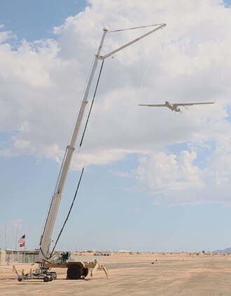 An RQ-21A Blackjack Unmanned Aerial System catches the rope of the Small Tactical Unmanned Aerial System Recovery equipment during training for Marine Unmanned Aerial Vehicle Squadron (VMU) 1 aboard Cannon Air Defense Complex in Yuma, Ariz., Aug. 16. VMU-1 received their new Blackjack’s in June and conducted training to increase their proficiency with the new aircraft before they deploy with the 15th Marine Expeditionary Unit next year. The new aircraft is runway independent and leaves a significantly smaller footprint than their previous UAS. (U.S. Marine Corps photo by Sgt. Brytani Wheeler)