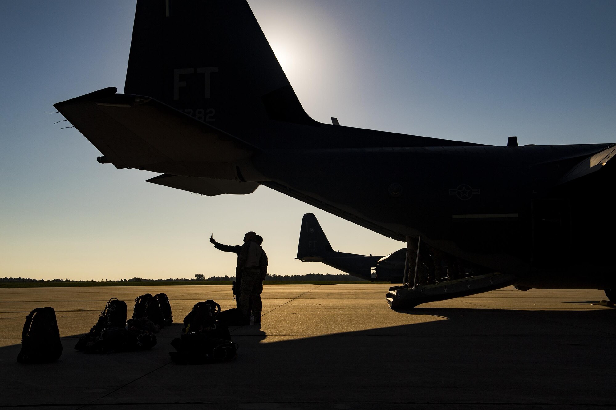 U.S. Air Force Airmen from the 38th Rescue Squadron take a selfie prior to boarding an HC-130J Combat King II for high-altitude, low-opening jumps, Aug. 18, 2016, at Moody Air Force Base, Ga. The jump was conducted to re-familiarize aircrew and pararescue members with processes for dropping from a high altitude which ensures world wide capabilities. (U.S. Air Force photo by Staff Sgt. Ryan Callaghan)
