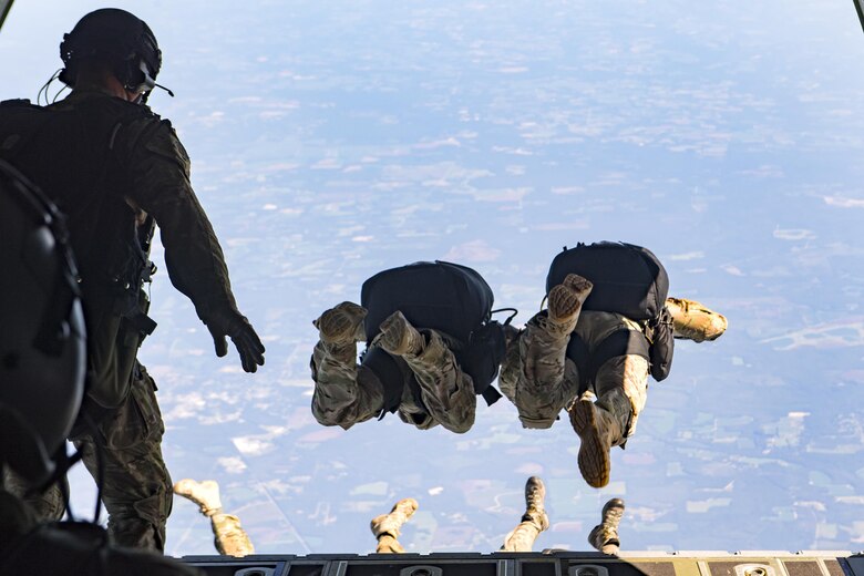 Pararescuemen jump from an HC-130J Combat King II at 25,000 feet, Aug. 18, 2016, in the skies over Moody Air Force Base, Ga. Pararescuemen are qualified experts in Airbourne and Military Free Fall operations, to include high-altitude, low opening techniques. (U.S. Air Force photo by Staff Sgt. Ryan Callaghan)
