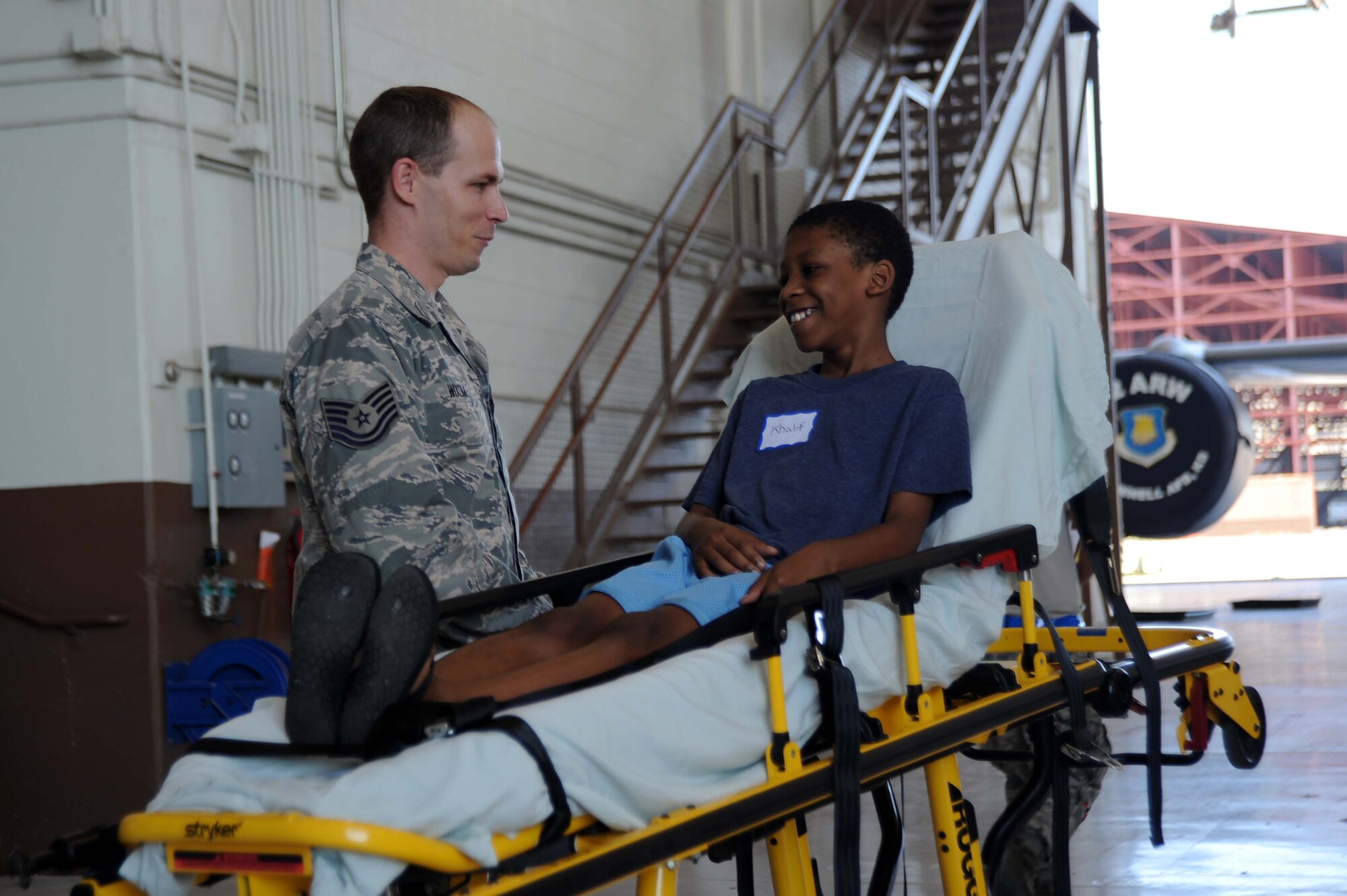 McConnell Airmen interact with children from the local community during the annual “Big for a Day” event, Aug. 9, 2016, at McConnell Air Force Base, Kan. The event, in conjunction with the organization Big Brothers Big Sisters, allowed children to learn about different jobs in the Air Force with demonstrations from base organizations like the fire department and military working dogs. “We’re hoping the kids learn and have fun today,” said Amanda Foy, Big Brothers Big Sisters volunteer enrollment specialist. “And we are also hoping to recruit some more volunteers for the program and match the kids we have here on our waiting list with a positive role model.” (U.S. Air Force photos/Airman 1st Class Jenna K. Caldwell)