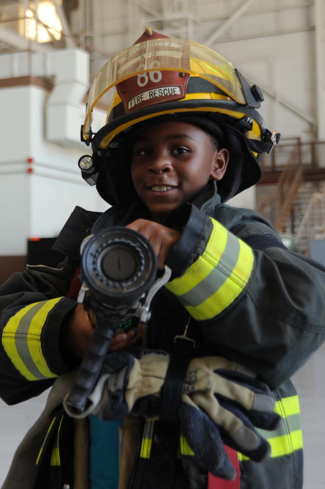 McConnell Airmen interact with children from the local community during the annual “Big for a Day” event, Aug. 9, 2016, at McConnell Air Force Base, Kan. The event, in conjunction with the organization Big Brothers Big Sisters, allowed children to learn about different jobs in the Air Force with demonstrations from base organizations like the fire department and military working dogs. “We’re hoping the kids learn and have fun today,” said Amanda Foy, Big Brothers Big Sisters volunteer enrollment specialist. “And we are also hoping to recruit some more volunteers for the program and match the kids we have here on our waiting list with a positive role model.” (U.S. Air Force photos/Airman 1st Class Jenna K. Caldwell)