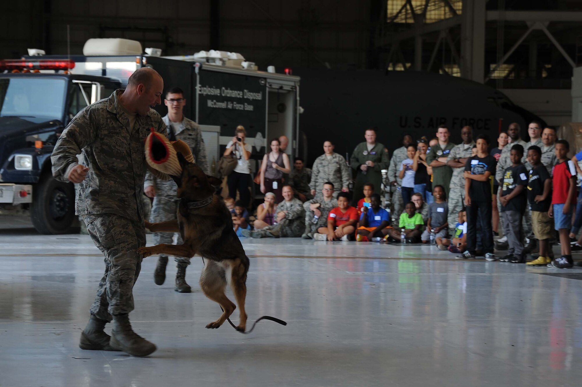 McConnell Airmen interact with children from the local community during the annual “Big for a Day” event, Aug. 9, 2016, at McConnell Air Force Base, Kan. The event, in conjunction with the organization Big Brothers Big Sisters, allowed children to learn about different jobs in the Air Force with demonstrations from base organizations like the fire department and military working dogs. “We’re hoping the kids learn and have fun today,” said Amanda Foy, Big Brothers Big Sisters volunteer enrollment specialist. “And we are also hoping to recruit some more volunteers for the program and match the kids we have here on our waiting list with a positive role model.” (U.S. Air Force photos/Airman 1st Class Jenna K. Caldwell)