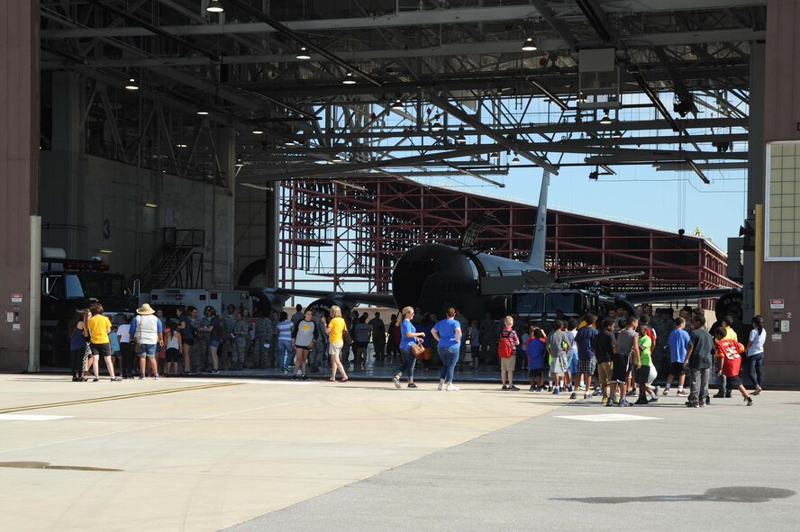 McConnell Airmen interact with children from the local community during the annual “Big for a Day” event, Aug. 9, 2016, at McConnell Air Force Base, Kan. The event, in conjunction with the organization Big Brothers Big Sisters, allowed children to learn about different jobs in the Air Force with demonstrations from base organizations like the fire department and military working dogs. “We’re hoping the kids learn and have fun today,” said Amanda Foy, Big Brothers Big Sisters volunteer enrollment specialist. “And we are also hoping to recruit some more volunteers for the program and match the kids we have here on our waiting list with a positive role model.” (U.S. Air Force photos/Airman 1st Class Jenna K. Caldwell)