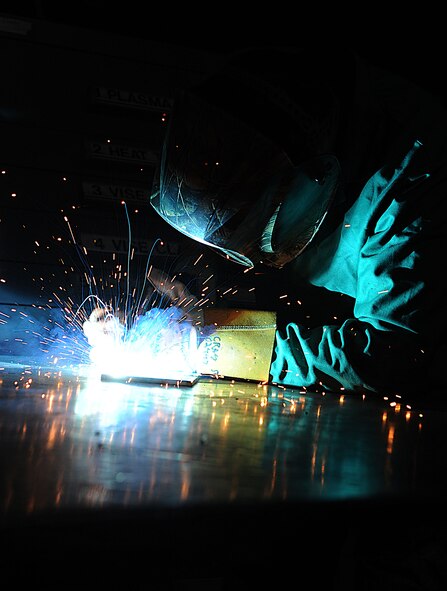 Senior Airman Caleb Ray, 5th Maintenance Squadron metals technology journeyman, welds the edge of a piece of metal at Minot Air Force Base, N.D., Aug. 18, 2016. Aircraft metal technicians design, weld, fabricate and locally manufacture tools for components and assemblies essential to aerospace weapon systems and related support equipment. (U.S. Air Force photo/Senior Airman Kristoffer Kaubisch)