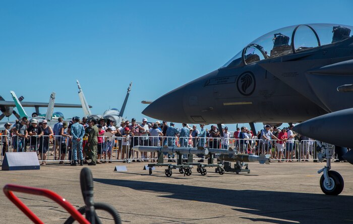 A crowd gathers in front of a Republic of Singapore Air Force F-15D display during Exercise Pitch Black 2016 Open Day at Royal Australian Air Force Base Darwin, Australia, Aug. 13, 2016. This event showcased military aircraft participating in Pitch Black, provided tours, and shared knowledge and experiences to the local community, helping them gain a new perspective on the international and regional importance of Pitch Black.  The biennial, multinational exercise involves approximately 10 allied nations and prepares these forces for possible real-world scenarios. The bilateral effort amongst Exercise Pitch Black 2016 furthermore showcases the strength amongst various militaries and solidifies the relationship across the Pacific region. (U.S. Marine Corps photo by Cpl. Nicole Zurbrugg)