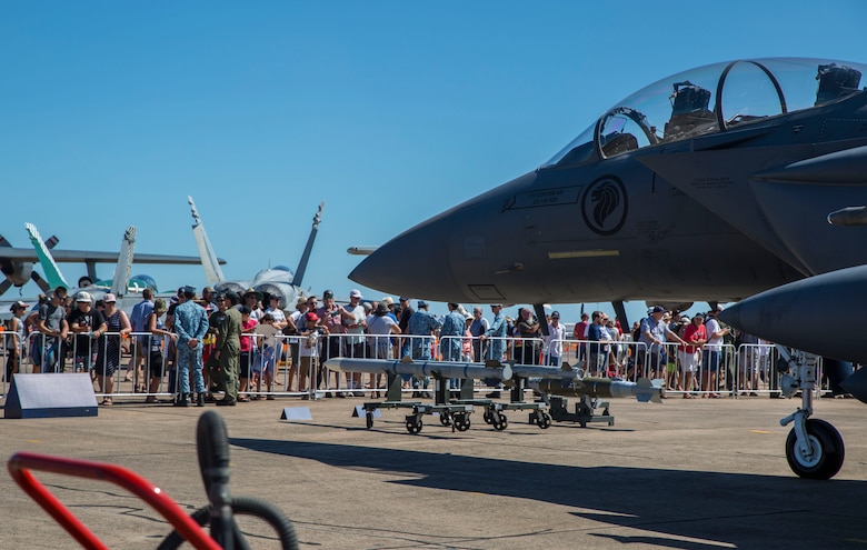 A crowd gathers in front of a Republic of Singapore Air Force F-15D display during Exercise Pitch Black 2016 Open Day at Royal Australian Air Force Base Darwin, Australia, Aug. 13, 2016. This event showcased military aircraft participating in Pitch Black, provided tours, and shared knowledge and experiences to the local community, helping them gain a new perspective on the international and regional importance of Pitch Black.  The biennial, multinational exercise involves approximately 10 allied nations and prepares these forces for possible real-world scenarios. The bilateral effort amongst Exercise Pitch Black 2016 furthermore showcases the strength amongst various militaries and solidifies the relationship across the Pacific region. (U.S. Marine Corps photo by Cpl. Nicole Zurbrugg)