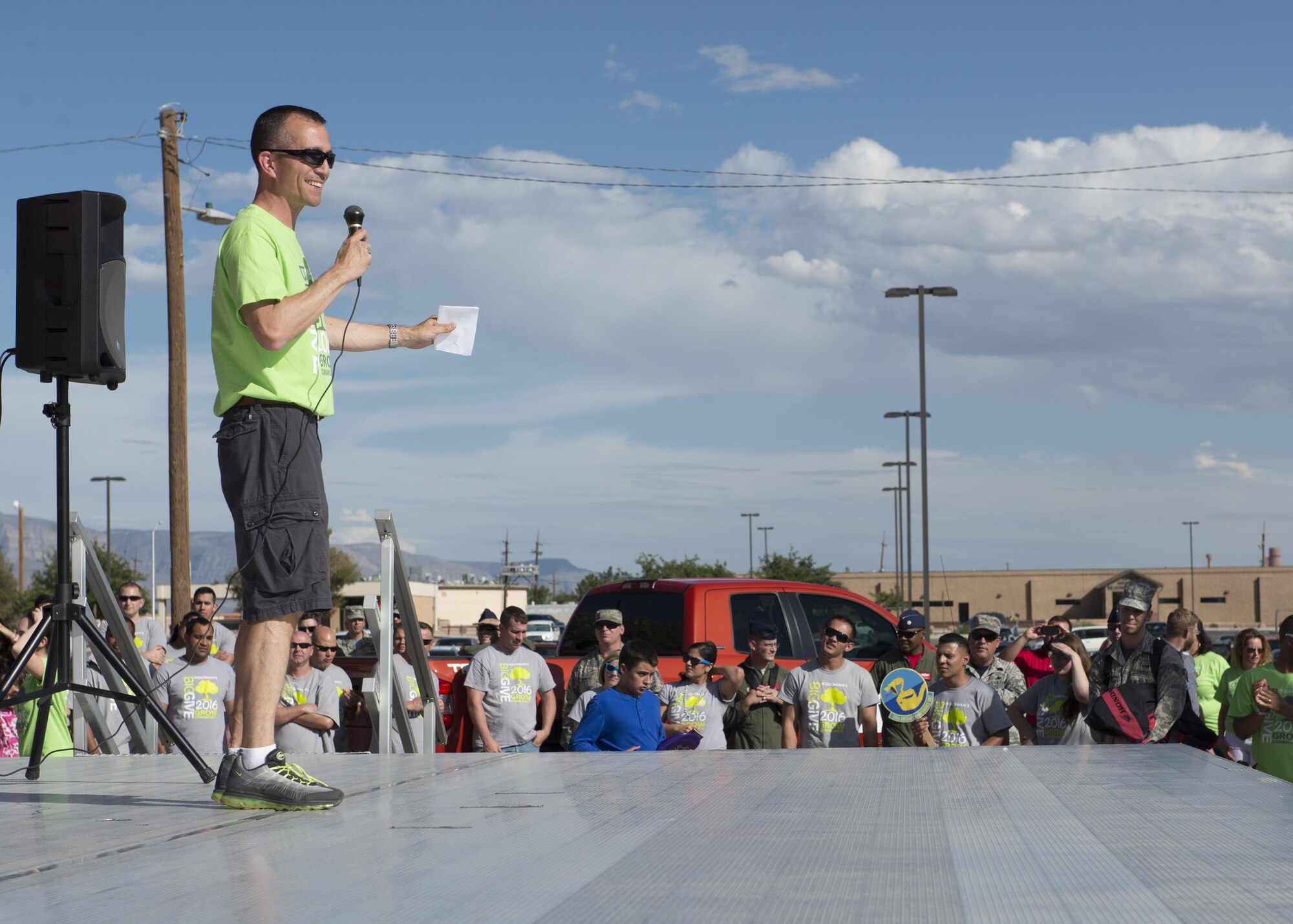 Col. Houston R. Cantwell, the commander of the 49th Wing, speaks to volunteers during the Big Give after-party August 12, 2016 at Holloman Air Force Base, N.M. Over the course of three weeks, 32 teams of 412 participants spent nearly 5,000 man hours volunteering in the local community — saving the area $202,092.33. (U.S. Air Force photo by Airman 1st Class Randahl J. Jenson)