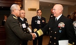 Gen. Nelson Pintos, chief of the Uruguayan Joint Staff, greets Navy Adm. Kurt W. Tidd, commander of U.S. Southern Command, prior to the start of the sixth annual South America Defense Conference in Montevideo, Uruguay, Aug. 17, 2016. Uruguay and the United States co-hosted military leaders from eight South American nations and Canada during the two-day event, where they examined the changing role of the military in the region, and participated in briefings, panels, discussions and meetings on global peacekeeping operations, transregional threat networks, and the integration of women in military service. Southcom photo by Jose Ruiz