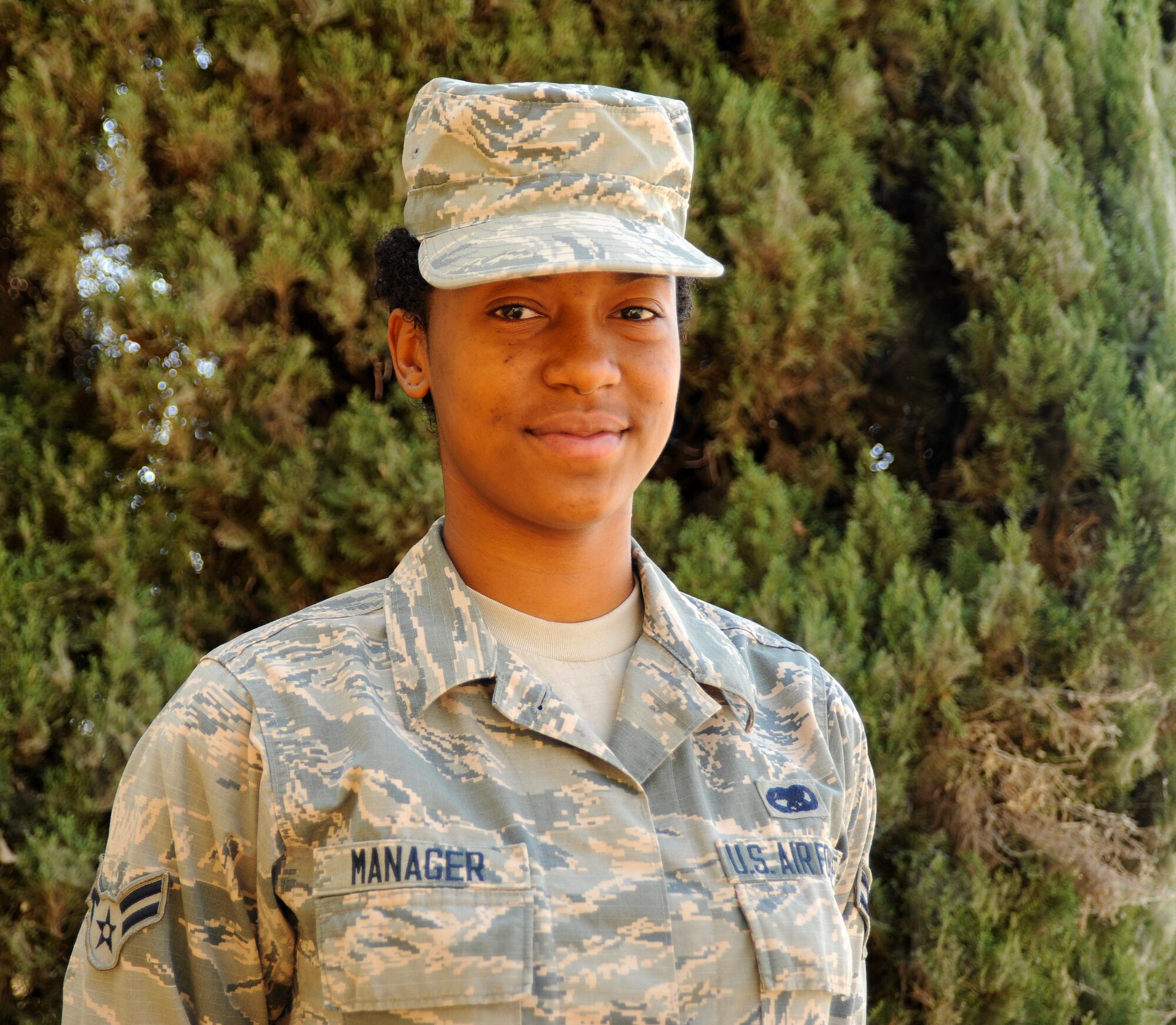 Airman 1st Class Aureon Manager,  9th Aircraft Maintenance Squadron electrical and environmental specialist, poses for a photo August 18, 2016, at Beale Air Force Base, California. (U.S. Air Force photo by Airman Tristan D. Viglianco)