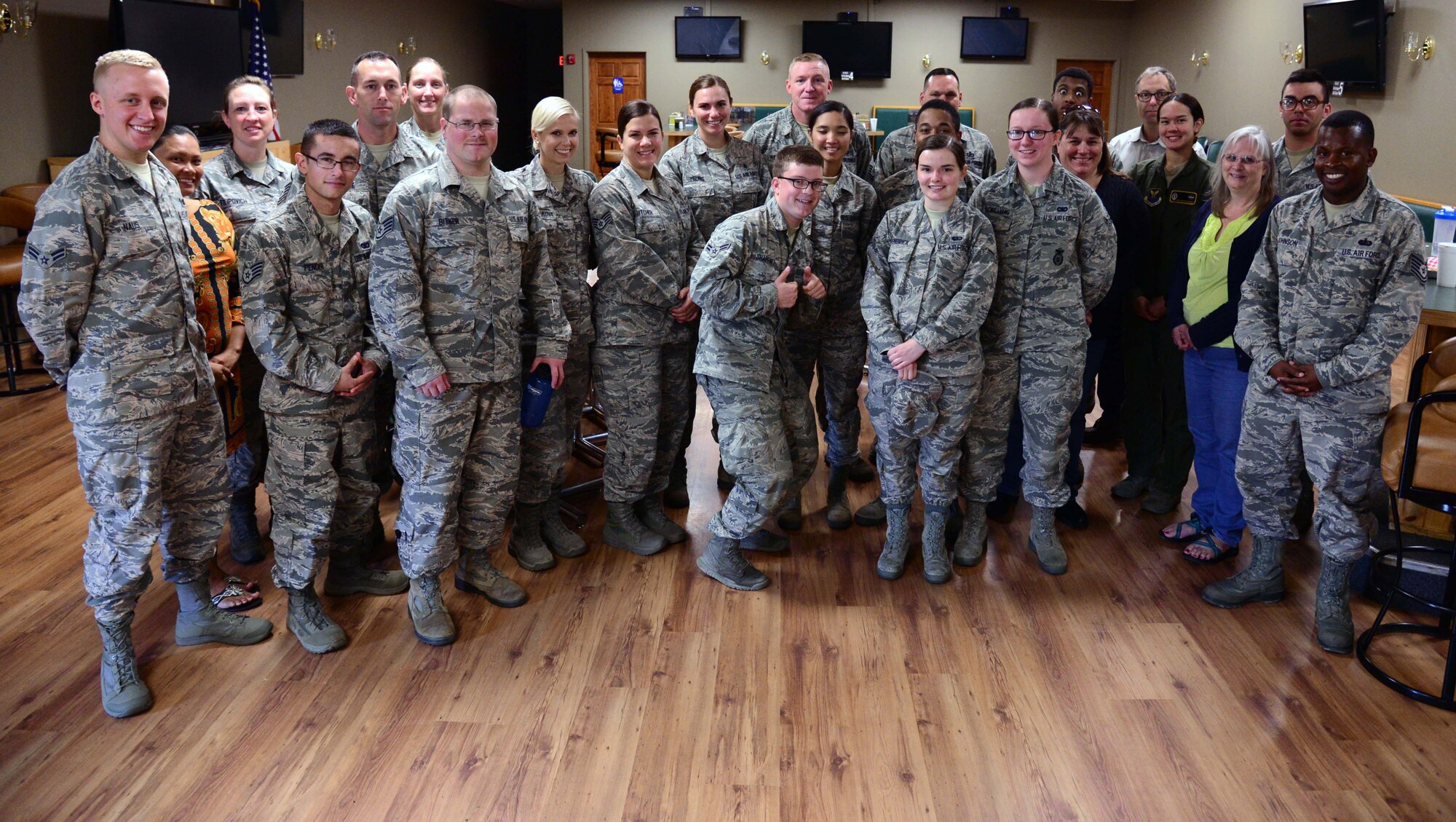 Airmen assigned to the 341st Missile Wing, pose at a Lean in Circle professional development luncheon Aug. 18, 2016, at Malmstrom Air Force Base, Mont. Chief Master Sgt. Fred Wetzel, 341st Security Forces Squadron superintendent, guest speaker, hosted a group discussion where he discussed issues Airmen face in their lives that cause stress and upset life balance which included school, family, personal time, volunteering, career progression, work and maintaining leadership roles. (U.S. Air Force photo/Airman 1st Class Magen M. Reeves)
