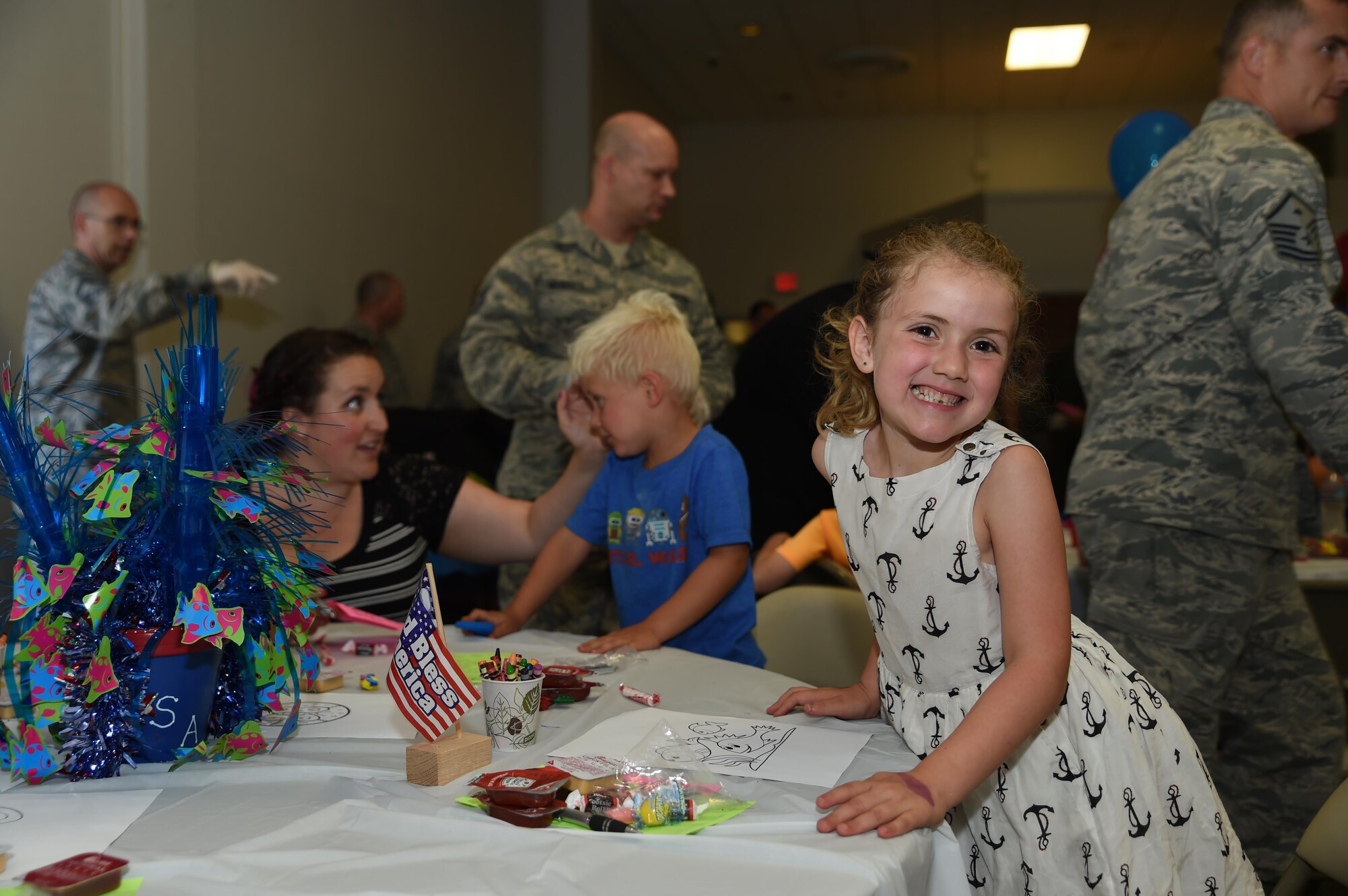 A child of a deployed McChord member attends the Deployed Family Dinner August 15, 2016, at the Chapel Support Center, Joint Base Lewis-McChord, Wash. The quarterly event offers entertainment and a catered meal to families whose loved ones are currently deployed, have recently deployed or will be deploying in the near future. (U.S. Air Force photo/Staff Sgt. Naomi Shipley)