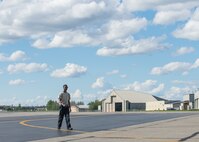 U.S. Air Force Senior Airman Christopher Tidline, a 354th Maintenance Squadron aircrew egress technician who is cross-utilized as a crew chief for the 354th Aircraft Maintenance Squadron, conducts a foreign object and debris check while preparing an F-16 Fighting Falcon aircraft for a sortie Aug. 17, 2016, during RED FLAG-Alaska 16-3 at Eielson Air Force Base, Alaska. Airmen sharpen their combat skills by working in the exercise, which is aimed at creating a realistic threat environment at simulated forward operating bases. (U.S. Air Force photo by Staff Sgt. Shawn Nickel)
