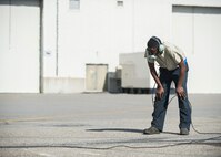 U.S. Air Force Senior Airman Christopher Tidline, a 354th Maintenance Squadron aircrew egress technician who volunteered to be cross-utilized in a crew chief’s role for the 354th Aircraft Maintenance Squadron, looks into an exhaust nozzle while preparing an F-16 Fighting Falcon aircraft for a sortie Aug. 17, 2016, during RED FLAG-Alaska 16-3 at Eielson Air force Base, Alaska. Free exchange of ideas between multilateral forces during RF-A enhances not just partners and sister service relationships, but also their operational efficiency. (U.S. Air Force photo by Staff Sgt. Shawn Nickel)