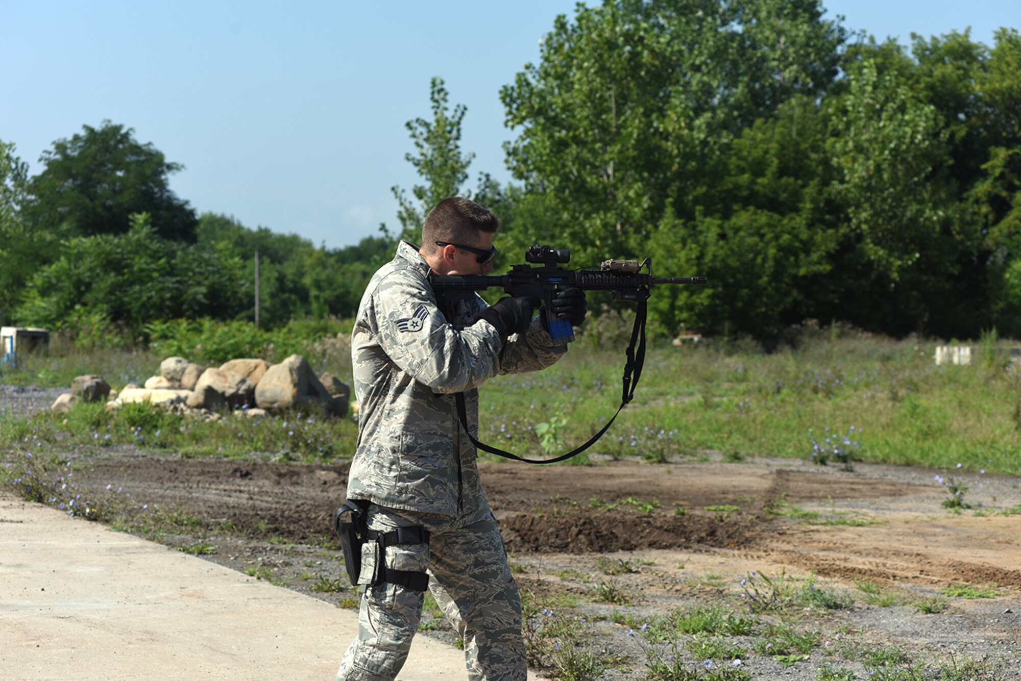 Senior Airman Brendan Leach, 109th Security Forces Squadron, goes through a combat combative obstacle course on Aug. 11, 2016 at Stratton Air National Guard Base, New York. The course was part of a weeklong pre-deployment training Warrior Week for Security Forces Airmen here. (U.S. Air National Guard photo by Master Sgt. William Gizara/Released)