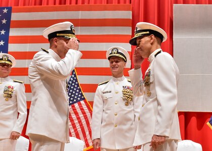 160817-N-ED185-237
FLEET ACTIVITIES YOKOSUKA, Japan (Aug. 17, 2016) Rear Adm. William R. Merz and Rear Adm. Richard Correll exchange salutes during their change of command ceremony. Correll relieved Merz as the 45th commander of Submarine Group 7. (U.S. Navy photo by Mass Communication Specialist 2nd Class Brian G. Reynolds)
