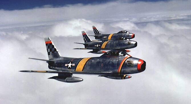 A three-ship formation of F-86F Sabres assigned to the 51st Fighter-Interceptor Wing fly over Korea in 1953. The 51st Fighter Wing, under various designations, fought in the Korean War and has provided aerial support and deterrence on the Korean Peninsula since 1971. (Courtesy photo)