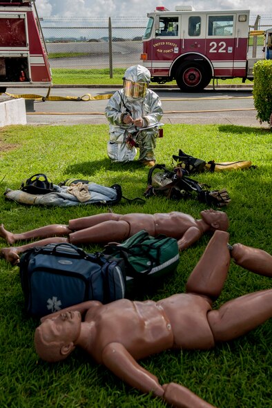 An 18th Civil Engineer Squadron firefighter performs post-exercise checklists during a tower evacuation drill Aug. 15, 2016, at Kadena Air Base, Japan. The drill trained firefighters how to negotiate the air control tower for simulated smoke, fire, casualty recovery, personnel evacuation. (U.S. Air Force photo by Senior Airman Peter Reft)
