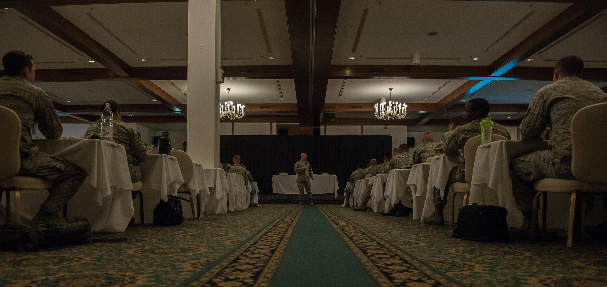 Senior Master Sgt. Clinton Ellis, 569th U.S. Forces Police Squadron logistics superintendent, speaks to a crowd of senior NCO and senior NCO selects during a professional enhancement seminar Aug. 11, 2016, at Ramstein Air Base, Germany. More than 165 Airmen are becoming senior NCO’s, demonstrating that Team Ramstein’s PES is made to ensure SNCO’s make the transition as smooth as possible. (U.S. Air force photo/Airman 1st Class Lane T. Plummer)